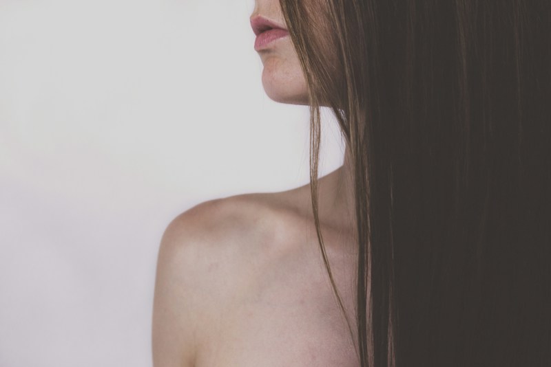 Woman with long straight brown hair